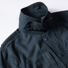 material shot of the collar on The Pathfinder Jacket in Dark Navy Dry Wax, Outerwear by Taylor Stitch