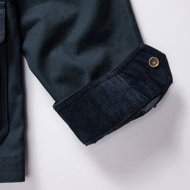 material shot of the corduroy cuffs on The Pathfinder Jacket in Dark Navy Dry Wax, Outerwear by Taylor Stitch