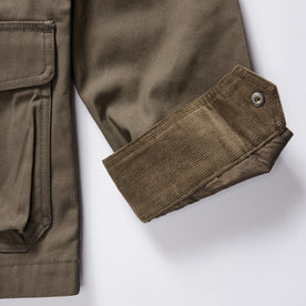 material shot of the cuffs on The Pathfinder Jacket in Fatigue Olive Dry Wax, Outerwear by Taylor Stitch