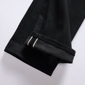 material shot of the cuffs on The Slim Jean in Black Nihon Menpu Selvage, Bottoms by Taylor Stitch