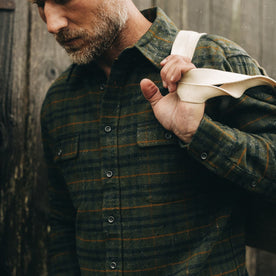 fit model showing the front flap chest pockets on The Yosemite Shirt in Dark Forest Plaid, Wovens by Taylor Stitch