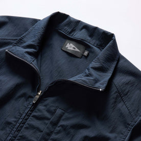 material shot of the collar on The Deploy Packable Shell in Dark Navy, Outerwear by Taylor Stitch