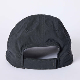 material shot of the back closure on The Performance TAC Hat in Black, Accessories by Taylor Stitch