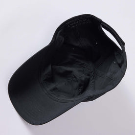 material shot of the inside of The Performance TAC Hat in Black, Accessories by Taylor Stitch