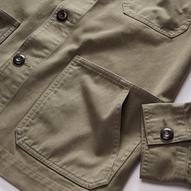 material shot of the pocket on The Ojai Jacket in Organic Smoked Olive Foundation Twill, Outerwear by Taylor Stitch