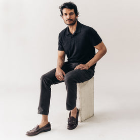 fit model showing off The Merino Polo in Heather Black, Knits by Taylor Stitch