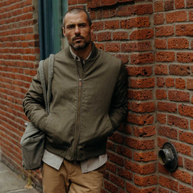 The Insulated Bomber Jacket in Fatigue Olive Dry Wax - featured image