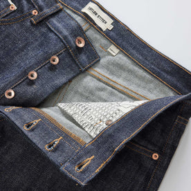 material shot of the button fly on The Democratic Jean in Rigid Organic Selvedge, Bottoms by Taylor Stitch