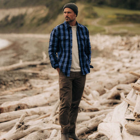 fit model posing in The Division Shirt in Rinsed Indigo Plaid, Wovens by Taylor Stitch