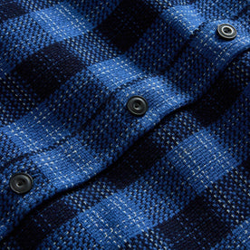 material shot of the buttons on The Division Shirt in Rinsed Indigo Plaid, Wovens by Taylor Stitch