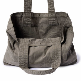 editorial image of the inner pockets on The Foundation Tote in Organic Smoked Olive, Accessories by Taylor Stitch