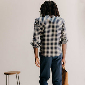 fit model showing off the back of The Jack in Deep Blue Plaid, Wovens by Taylor Stitch