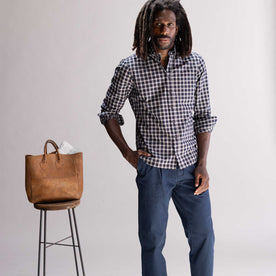 fit model with his hand in his pocket wearing The Jack in Deep Blue Plaid, Wovens by Taylor Stitch