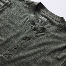 material shot of the collar on The Merino Henley in Heather Army, Knits by Taylor Stitch