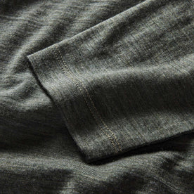 material shot of the sleeve on The Merino Henley in Heather Army, Knits by Taylor Stitch