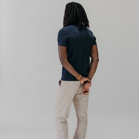 fit model showing off the back of The Organic Cotton Short Sleeve Crew in Dark Navy Waffle, Knits by Taylor Stitch