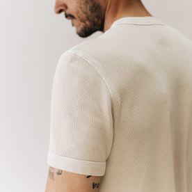 fit model showing off the waffle detail on The Organic Cotton Short Sleeve Crew in Vintage White Waffle, Knits by Taylor Stitch