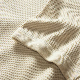 material shot of the sleeves on The Organic Cotton Short Sleeve Crew in Vintage White Waffle, Knits by Taylor Stitch