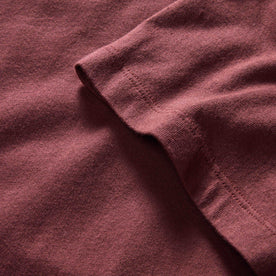 material shot of the sleeves on The Organic Cotton Tee in Dried Cherry, Knits by Taylor Stitch