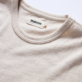 material shot of the collar on The Organic Cotton Tee in Heather Oat, Knits by Taylor Stitch