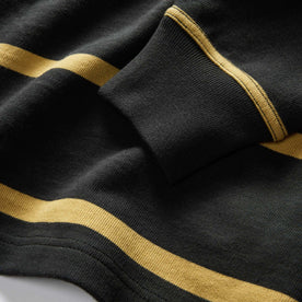 material shot of the sleeves on The Rugby Shirt in Faded Black Stripe, Knits by Taylor Stitch