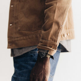 fit model showing off the cuffs on The Ryder Jacket in Tobacco Chipped Canvas, Outerwear by Taylor Stitch