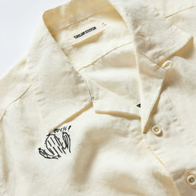 material shot of the collar on The Short Sleeve Davis Shirt in Embroidered Natural, Wovens by Taylor Stitch