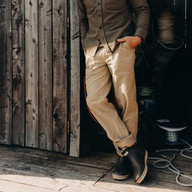 fit model with his hand in the pocket of The Surplus Pant in Khaki Reverse Sateen, Bottoms by Taylor Stitch