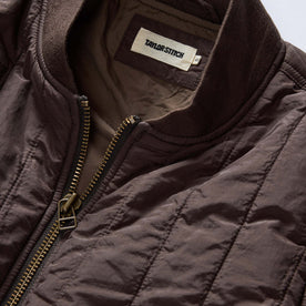 material shot of the collar on The Able Jacket in Soil Quilted Nylon, Outerwear by Taylor Stitch