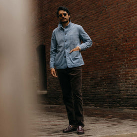 fit model walking wearing The Carnegie Pant in Soil Corduroy, Bottoms by Taylor Stitch