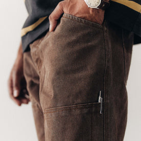 fit model showing off the pocket on The Chore Pant in Aged Penny Chipped Canvas, Bottoms by Taylor Stitch