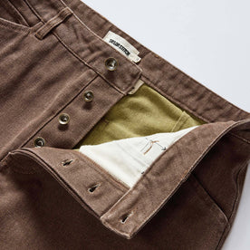 material shot of the button fly on The Chore Pant in Aged Penny Chipped Canvas, Bottoms by Taylor Stitch