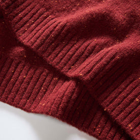 material shot of the hem on The Lodge Sweater in Bonfire Donegal, Knits by Taylor Stitch