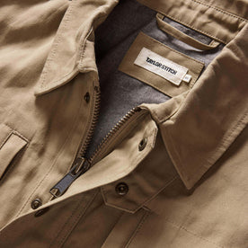 material shot of the collar on The Pathfinder Jacket in Khaki Dry Wax, Outerwear by Taylor Stitch