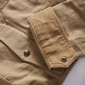 material shot of the cuff on The Pathfinder Jacket in Khaki Dry Wax, Outerwear by Taylor Stitch