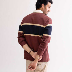 fit model showing off the back of The Rugby Shirt in Dried Cherry Stripe, Knits by Taylor Stitch