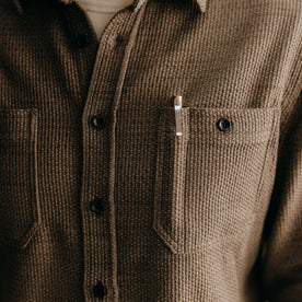 fit model showing off the buttons on The Utility Shirt in Cypress Sashiko, Wovens by Taylor Stitch