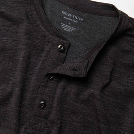 material shot of the buttons on The Merino Henley in Heather Black, Knits by Taylor Stitch