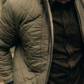 fit model showing the quilted side of The Carson Jacket in Light Khaki Fleece, Outerwear by Taylor Stitch