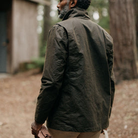 fit model showing the back of The Clutch Jacket in Soil Waxed Canvas, Outerwear by Taylor Stitch