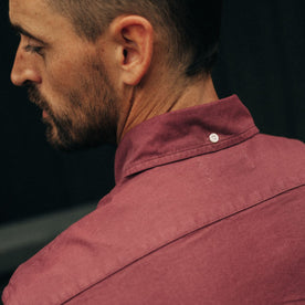 fit model showing the back of the button down collar on The Jack in Burgundy Oxford, Wovens by Taylor Stitch