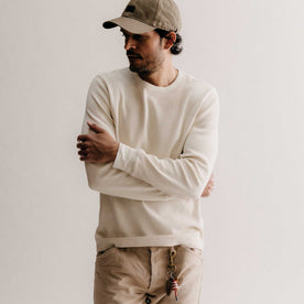 fit model in The Organic Cotton Waffle Crew in Natural, Knits by Taylor Stitch