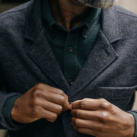 fit model buttoning The Ridgewood Cardigan in Navy Birdseye Wool, Knits by Taylor Stitch