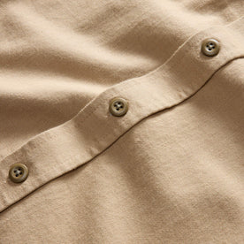 material shot of the buttons on The Saddler Shirt in Light Khaki Twill, Wovens by Taylor Stitch