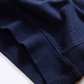 material shot of the hem on The Apres Crew in Indigo Terry, Knits by Taylor Stitch