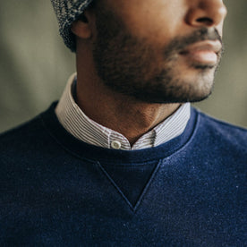 fit model showing the collar on The Apres Crew in Indigo Terry, Knits by Taylor Stitch