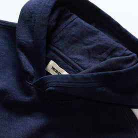 material shot of the hoodie on The Apres Hoodie in Indigo Terry, Knits by Taylor Stitch