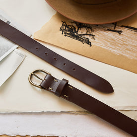 editorial image of The Foundation Belt in Dark Brown on sheets of paper, Accessories by Taylor Stitch