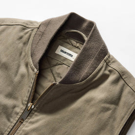 material shot of the neck opening on The Workhorse Vest in Stone Boss Duck, Outerwear by Taylor Stitch