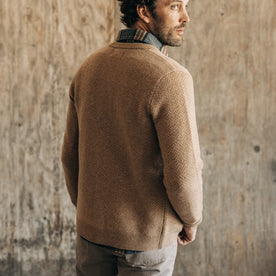 fit model showing the back of The Eddy Cardigan in Camel Herringbone Merino, Knits by Taylor Stitch